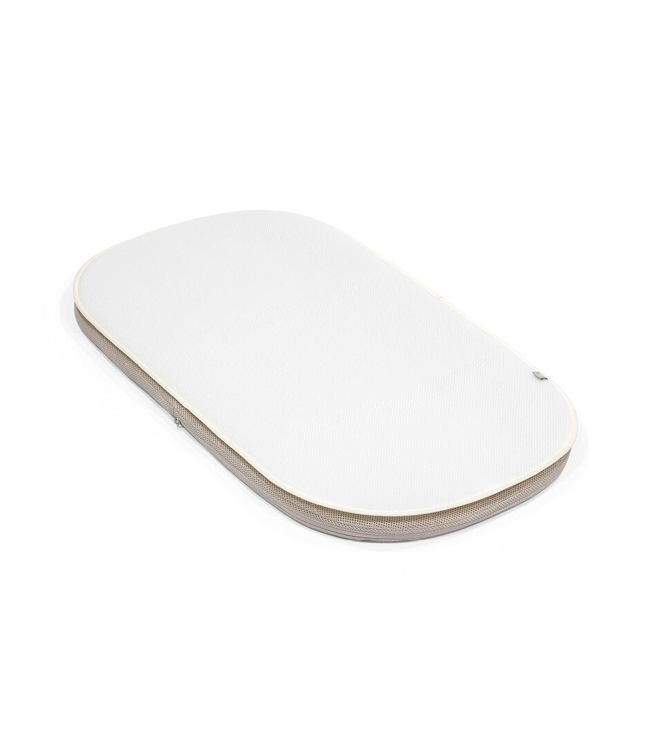 Stokke® Snoozi™ Протектор за матрак