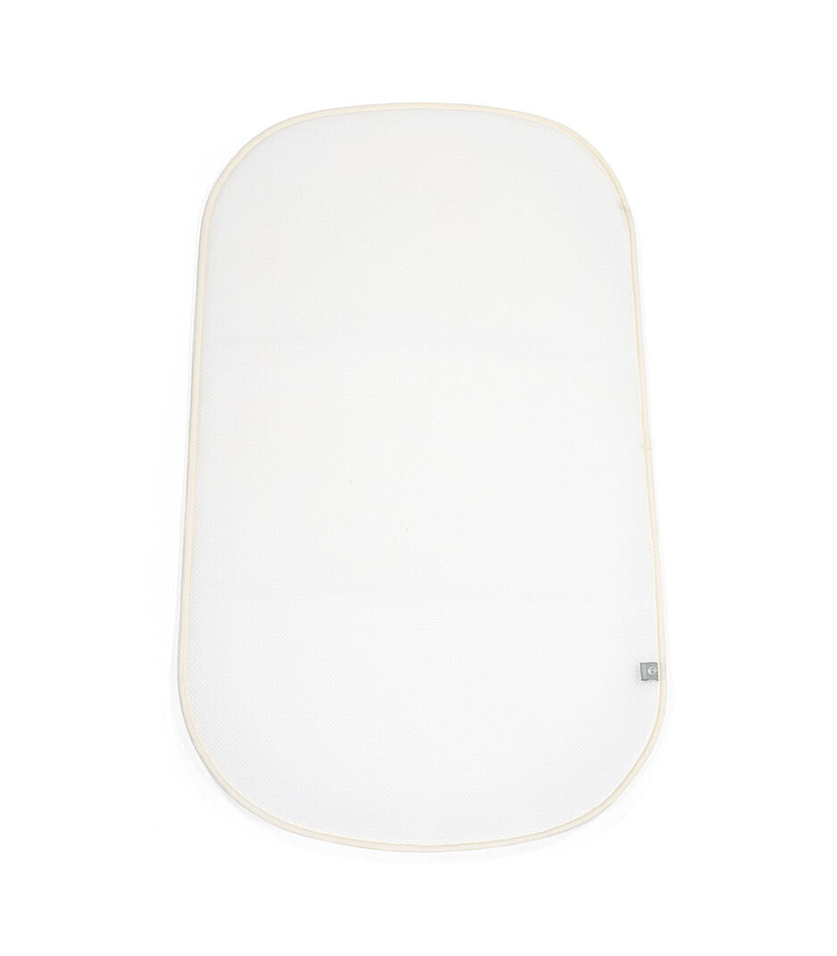 Stokke® Snoozi™ Протектор за матрак