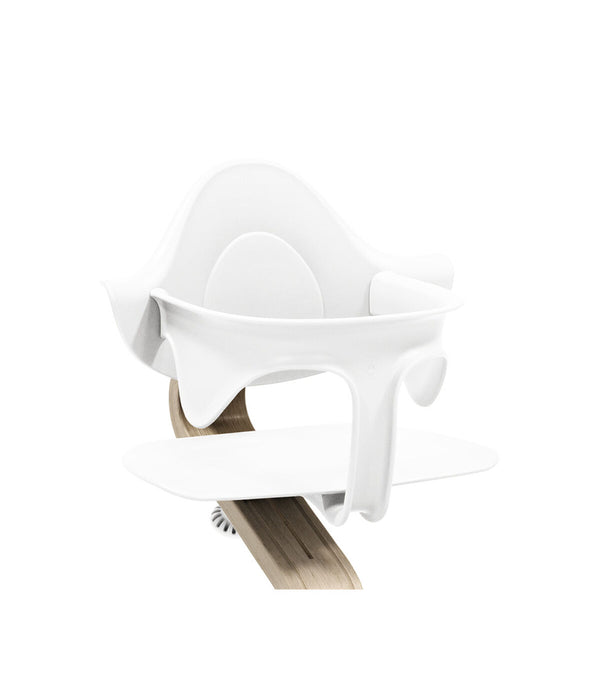 Stokke® Nomi® Приставка за 6+ месеца - цвят White