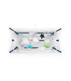 Stokke® Flexi bath Сгъваема ваничка с подложка - цвят Transparent Blue
